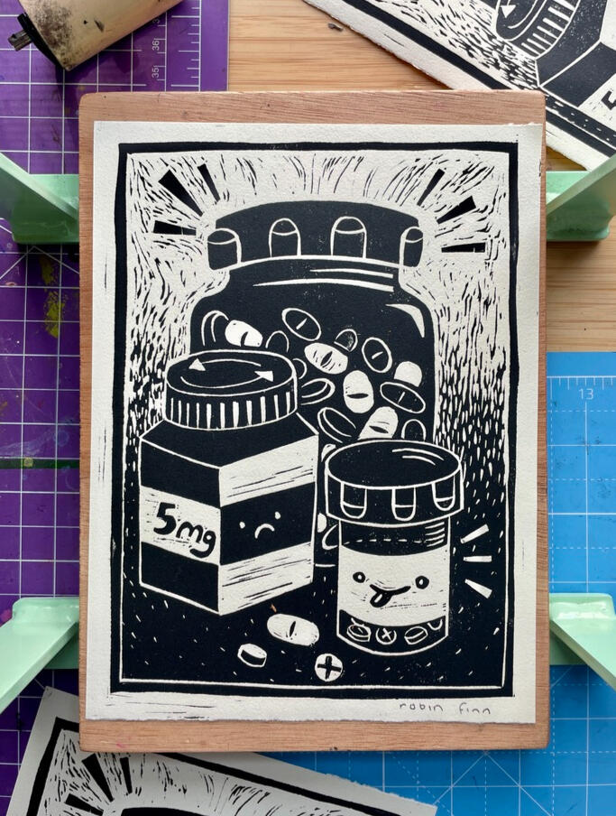 Linocut print still life of anthropomorphized pill bottles, one smiling with tongue out and another with a sad face.