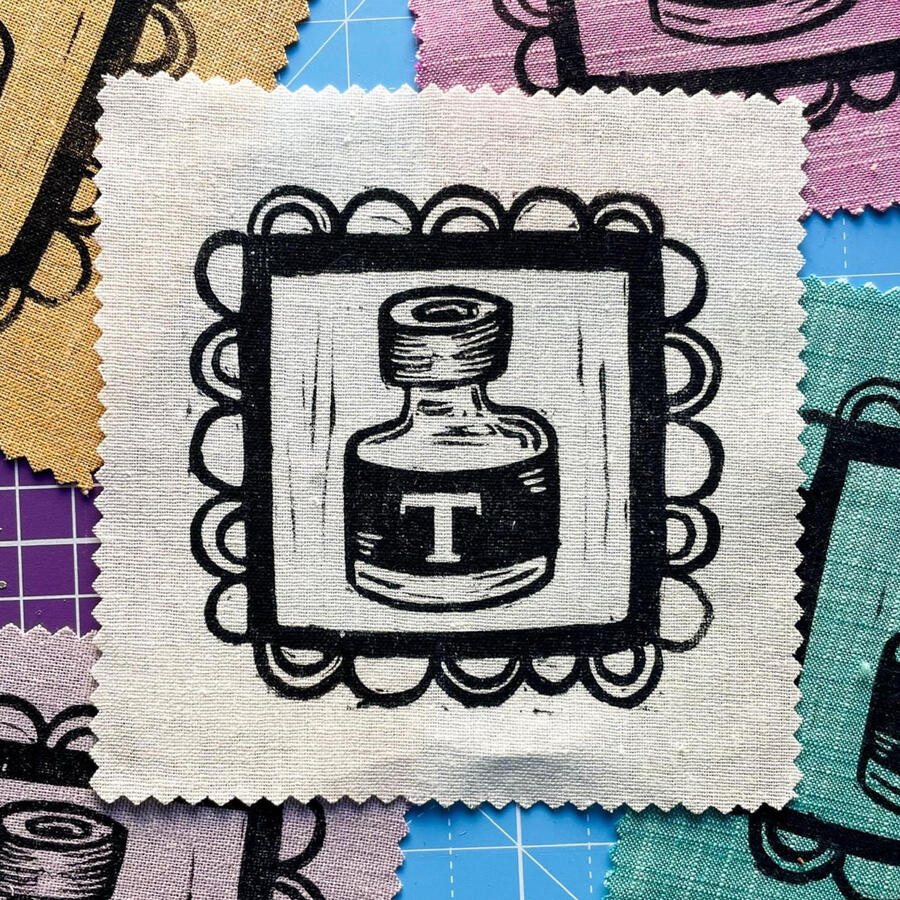 Block printed patch of a testosterone vial