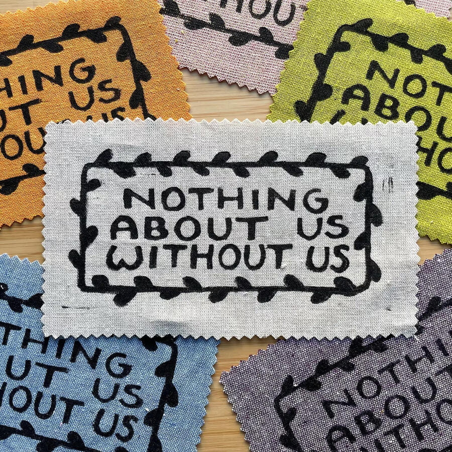 Nothing About Us Without Us | shop Block printed patches that read "Nothing About Us Without Us"
